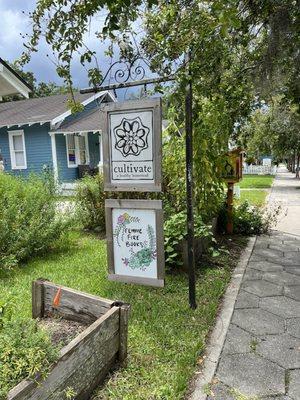 Sign in front of businesses.