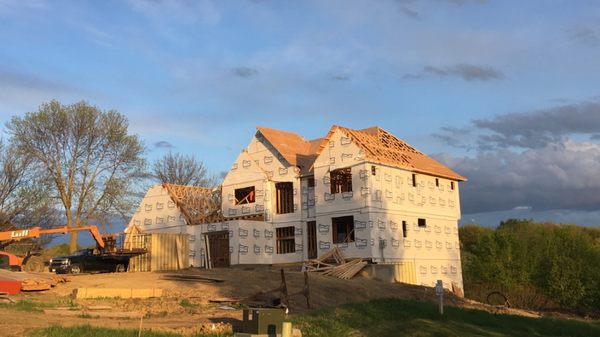 A 5,873 sqFt single family home Rough framed on lake minnetonka