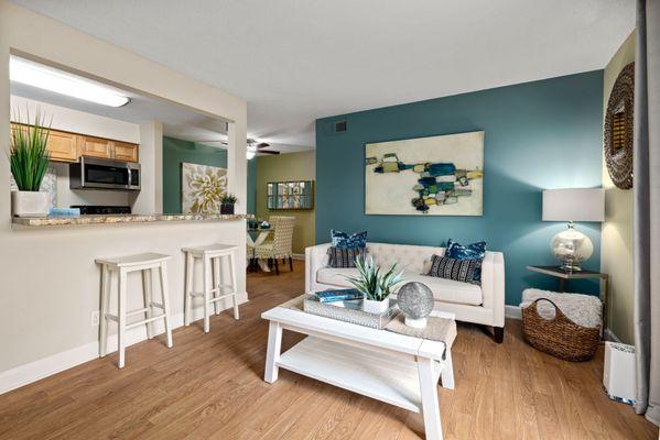 Living room with large patio doors and hardwood floors