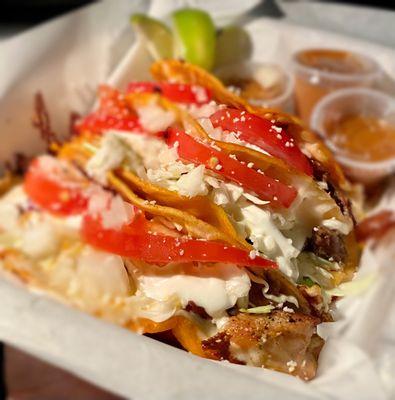 Taco flight: brisket, chicken and asada.