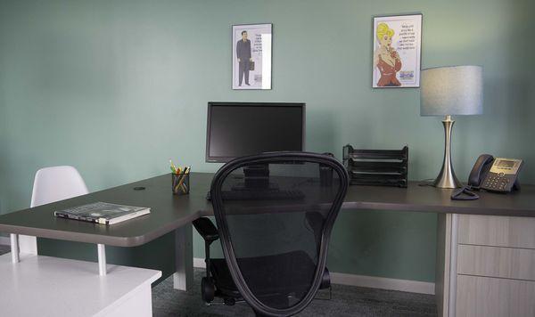 Single Studio Office with furnished desk and office furniture