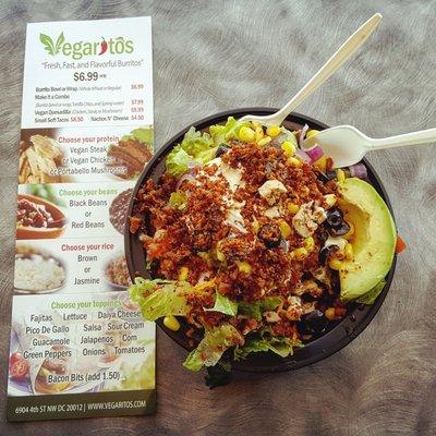 Burrito Bowl with Brown Rice, Black Beans, Cheese, Avocado, Chicken, Bacon Bits, Sour Cream, Veggies and AVOCADO. Delicious! All vegan.