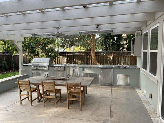 Alfresco Kitchen with grill, power burner, storage, fridge and sink