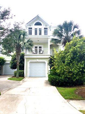 This palm trees  makes the house stand out more