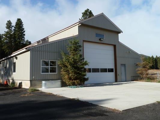 Heated warehouse-shop (4160 sq.ft.) has caretaker quarters and 14'6" X 16' wide electric door.Room for all special interests.