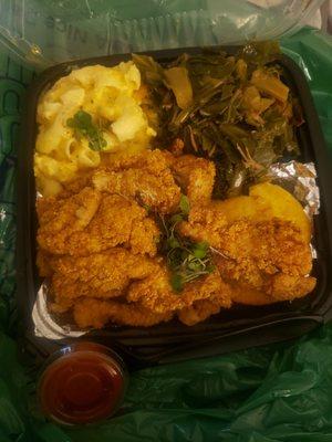 Catfish nuggets, Mac n cheese, and greens +1 cornbread muffin.