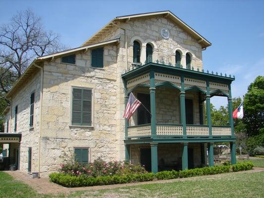 The Anton Wulff House (c. 1870) in the King William Historic District serves as our current headquarters.