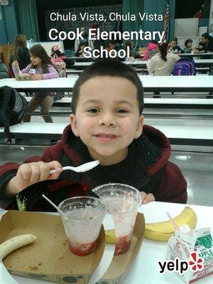 Angel eating my favorite school breakfast. Strawberry granola yogurt yum!!