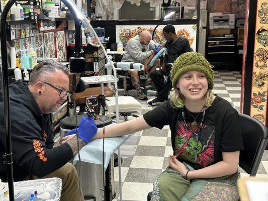 Audrey getting tattoo