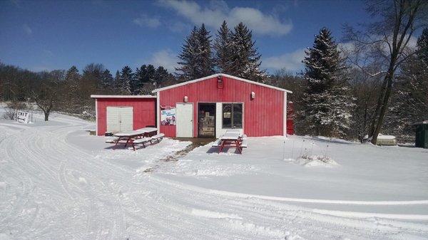 Located 4 miles north of Lyndon Station on county highway HH. Hard to find, but worth the effort to stop at the FAMOUS GARAGE BAR