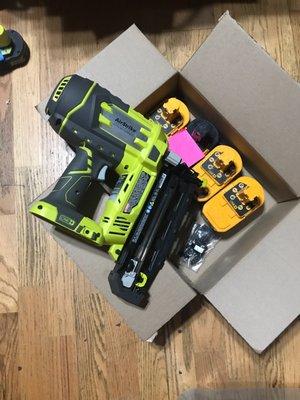 Cordless Ryobi nail gun and my old batteries they fixed for me!