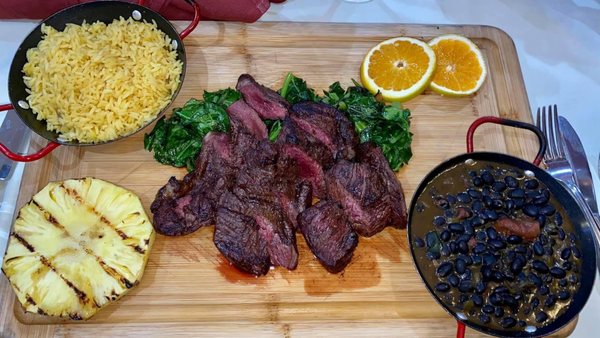 Steak rice and beans grilled pineapple