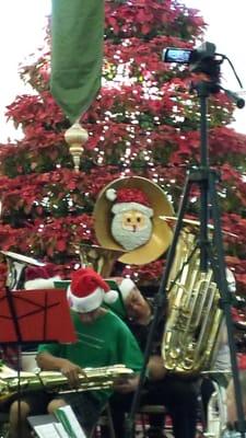 Cute Santa hanging from the tuba!