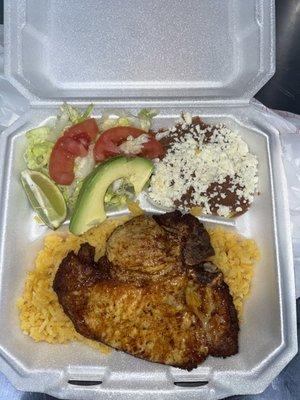 Pork Chop Plate with Refried Beans,Rice and Salad Choice - Lettuce or Cabbage (Image is Lettuce) Comes with 4 tortillas Price $16