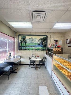 Eating area and a beautiful mural.