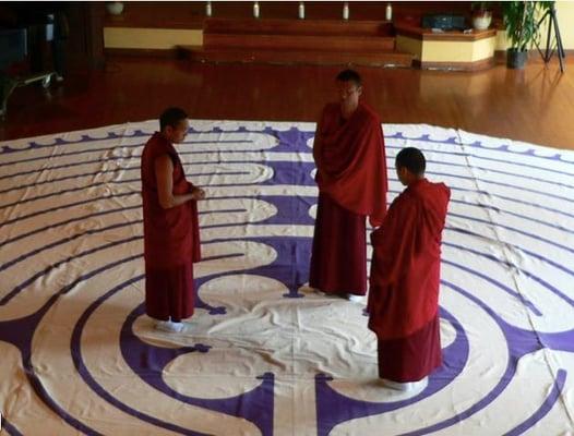 Our very special guests, the Tibetan Monks, walk our labyrinth.