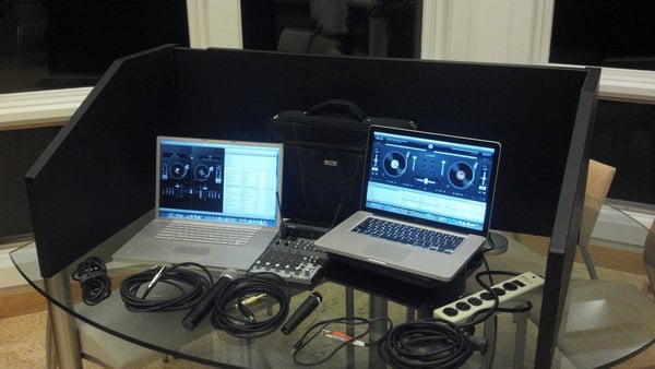 A pair of Apple Laptops running our DJ software