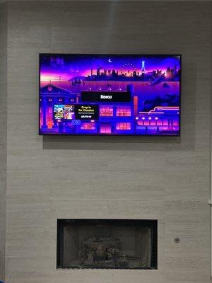 Tv mounting on tile fireplace