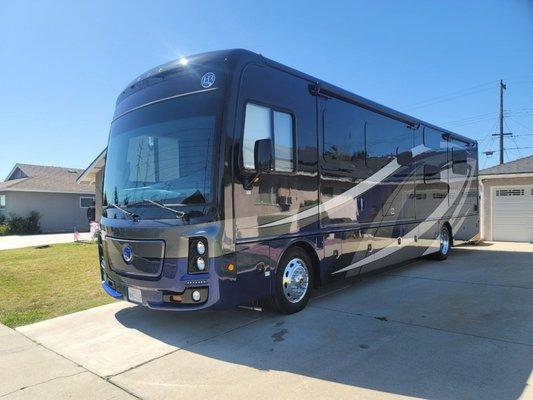 Here's a 2 stage paint correction detail.  So shiny you can see his house like a mirror on the side of his coach !!!