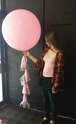 36" balloon with tail of tassels. Tassels can be customized to your colors.