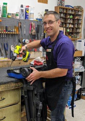 Owner Aaron at the Repair Bench