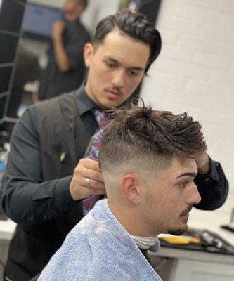 Ignite your confidence with the perfect cut from the talented barbers at No Grease! barbershop.