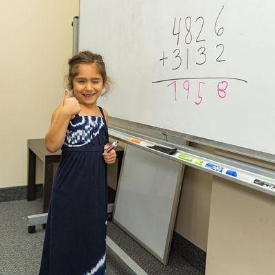 Aya mastering her advanced Math skills!