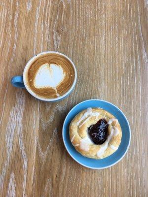 Latte and raspberry danish