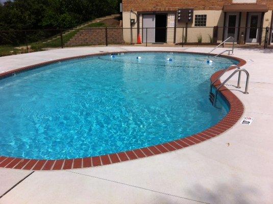 Beautiful community pool and sundeck to enjoy those hot summer days!