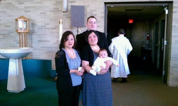 Lucas ' baptism 2-19-12 Grandma and parents