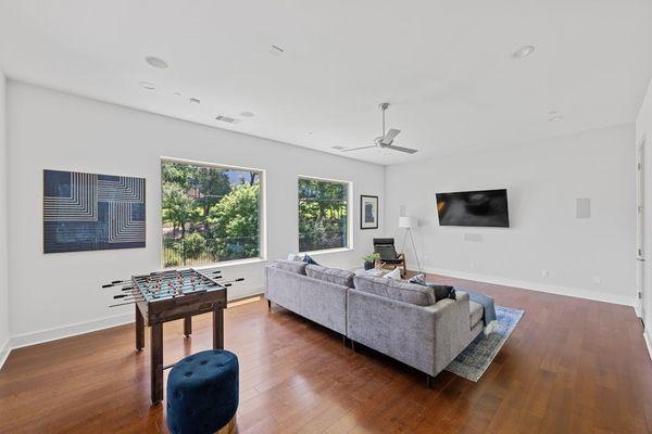 Family Room remodel including new hardwood floors, trim, Pella windows and paint.