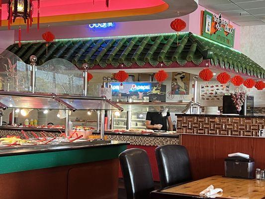 Sushi station under the green roof.