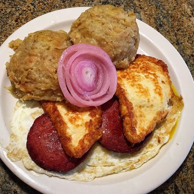 Tres Golpes - Mangú, Over Easy Eggs, Fried Salami, Fried Cheese and Red Onions