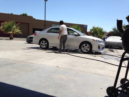 My brother washing my car :)