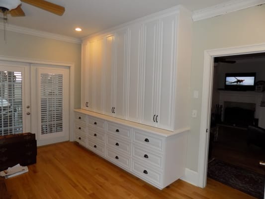 Wall Height Entertainment Dresser with Full View Hiding Center Doors.