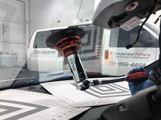 We use the best tools in the market! Equalizer Windshield cut out tool.