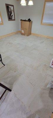 Installation of porcelain tile. ( 24x24)