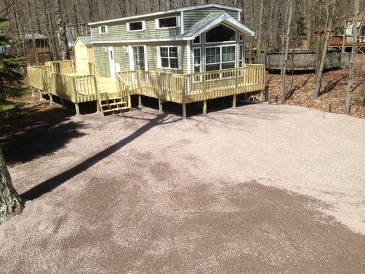 Gravel and grade work with new deck and shed