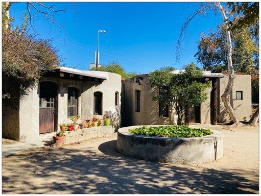 Casitas with a lily pond. I bet the rent is expensive. Lol.