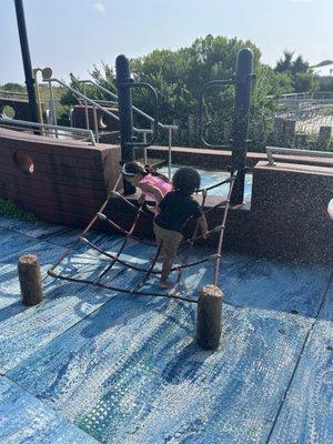 My son playing with his aunt at beach 30 park