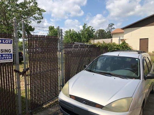 Failing Fence on Front of building