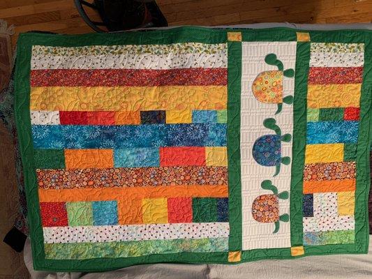 Burlington Quilters did the quilting in this baby quilt I made.  They did a beautiful job!