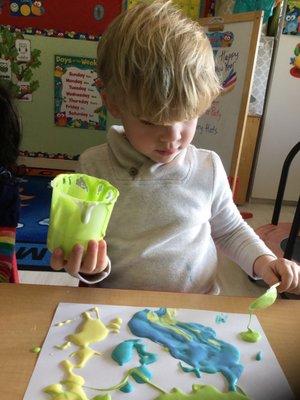 Painting in the owl class (3's)