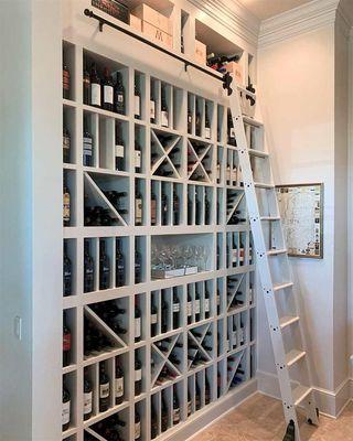 Quiet Glide Rolling Library Ladder in Wine Cellar Application