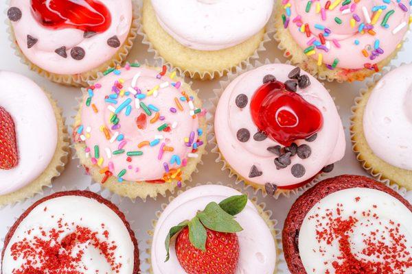 assorted cupcakes... cherry chip, funfetti, red velvet, strawberry shortcake