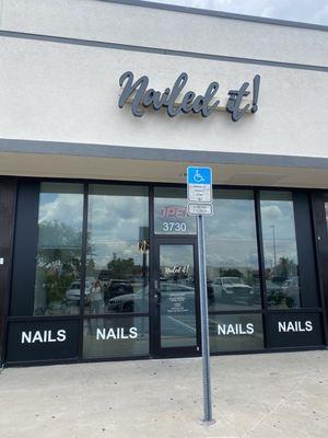 The new salon's front door and sign.