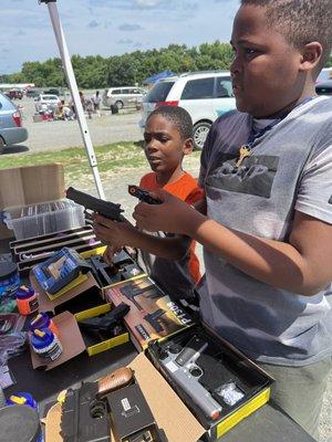 The Azalea Flee Market selling BB Guns That's supposed to be for 18-year-olds the box open where we couldn't see The required age