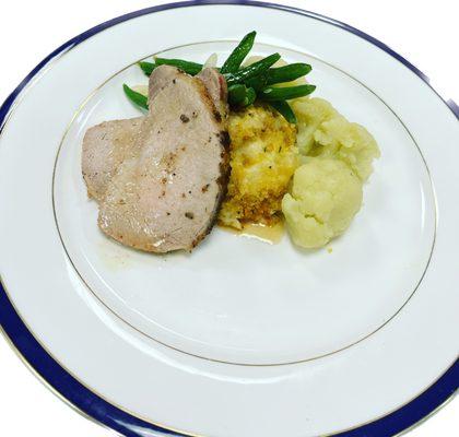 Pork loin w/ au gratin potatoes, green beans & cauliflower