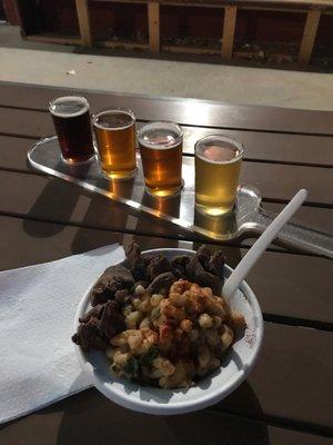 Brisket Mac and cheese $8.00 flight of beer $4.00