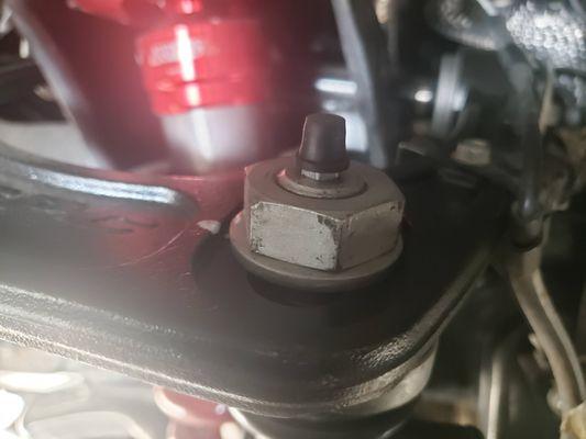 rounded upper ball-joint retaining nut